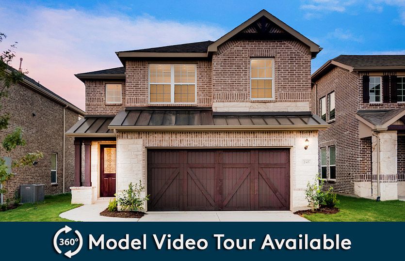 The Nelson, a two-story home with 2-car garage, shown with Home Exterior M