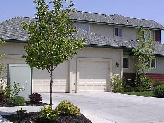 3-car garage and RV/boat parking sits on side of the house