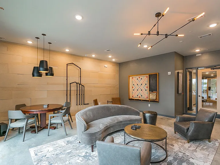 24-Hour Resident Lounge with Kitchenette and TV/Gaming Area