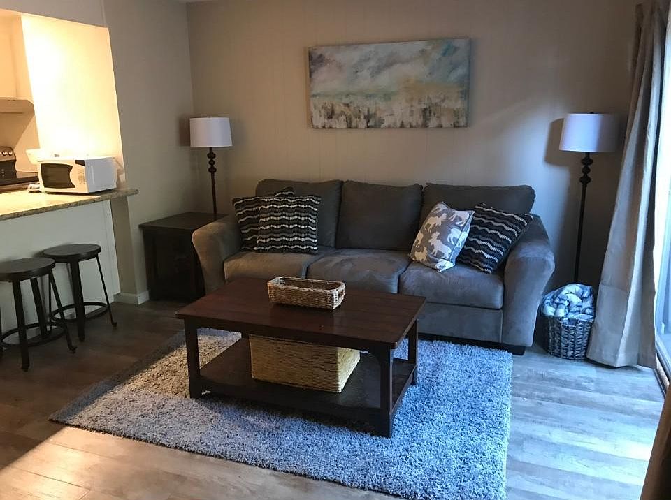Condo is not furnished but does fit an 8ft couch