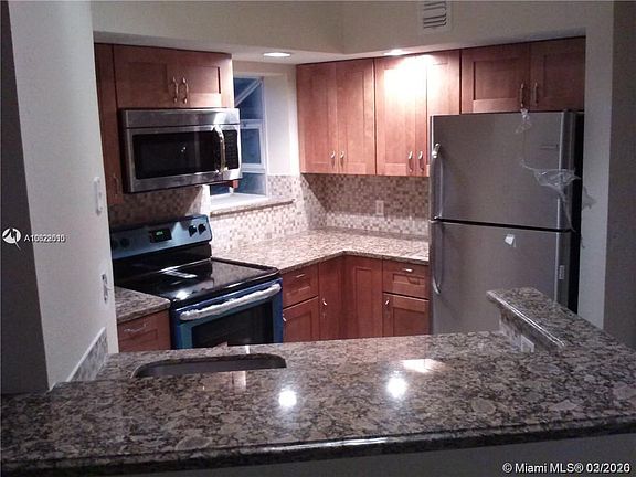 4th image of 3400 Pinewalk Dr N APT 933
