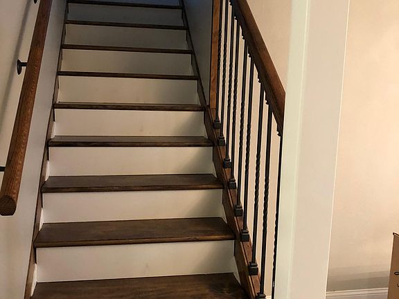 Stairs to two bedrooms and bath