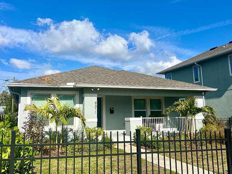 Fully gated front yard with recently completed landscaping and spacious front patio