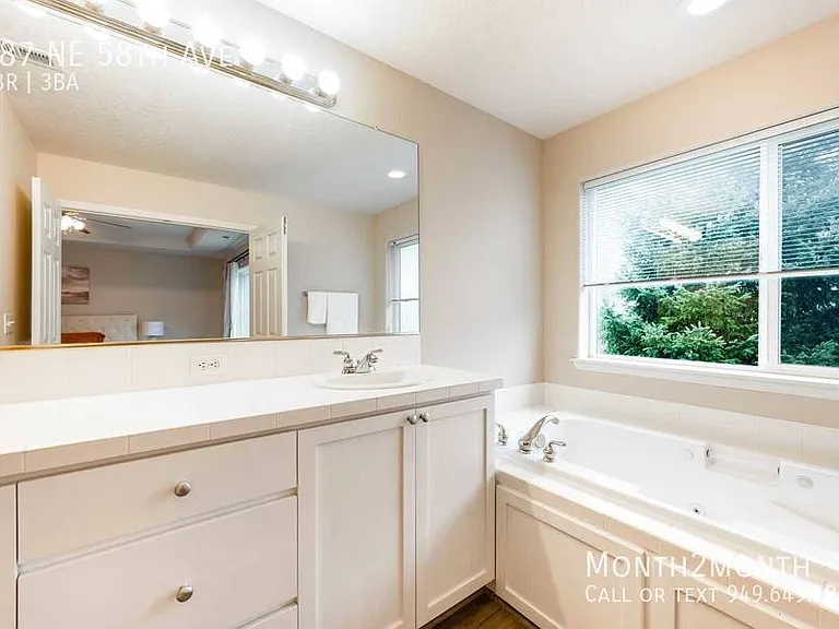 487 NE 58th Ave — Photo 19