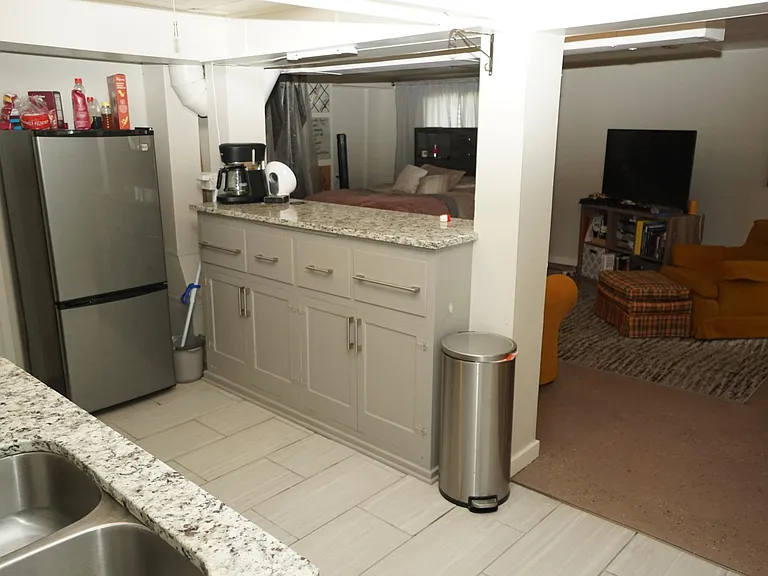 Bar is open to living area.
