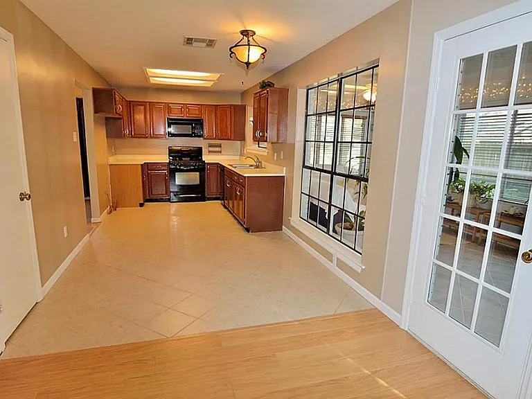 A view over the dining area to the kitchen.