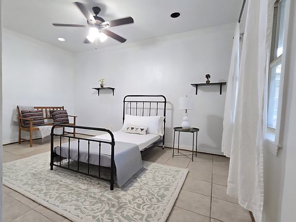 Newly painted master suite offering space, comfort, and a calming atmosphere.