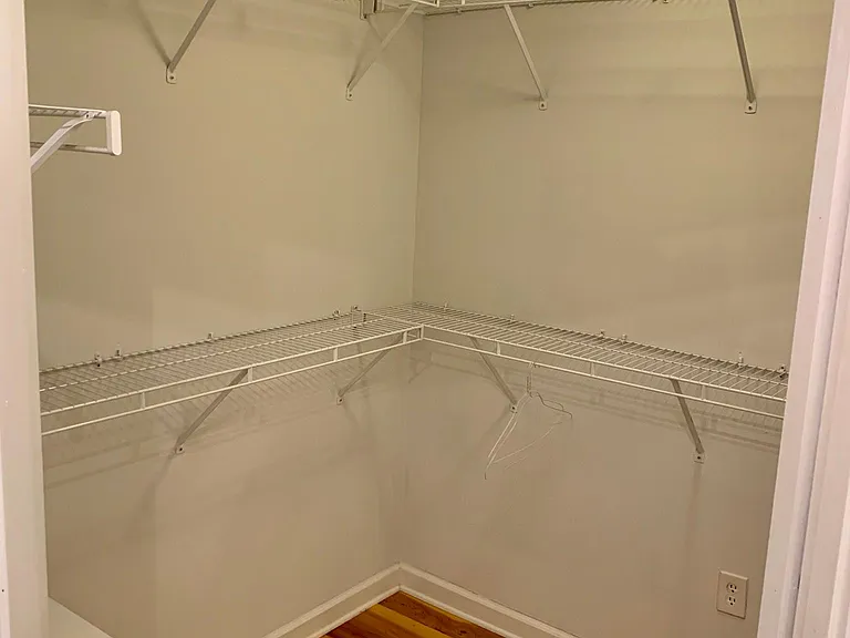 Spacious walk in closet located in owner's suite on first floor.