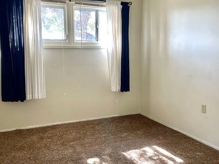 2nd Bedroom has LVP flooring now.