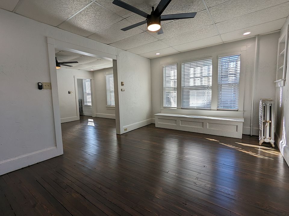 Newly refinished hardwood floors throughout the spacious and open 1st floor. Dining looking into living room