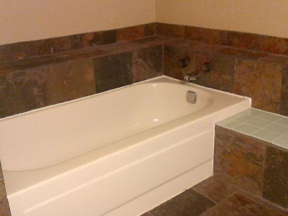 Slate soaking tub with separate shower