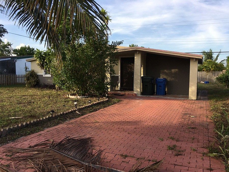1st image of 731 NE 58th Ct