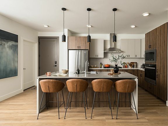 Experience the elegance and functionality of this modern kitchen.