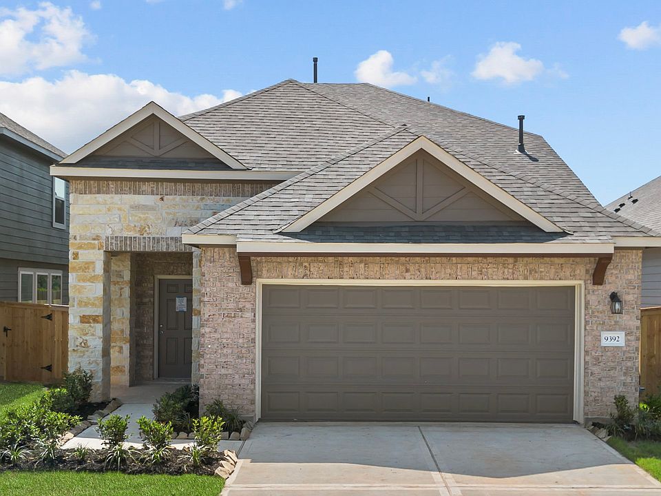 Welcome home to 9392 Hard Rock Road and zoned to Conroe ISD
