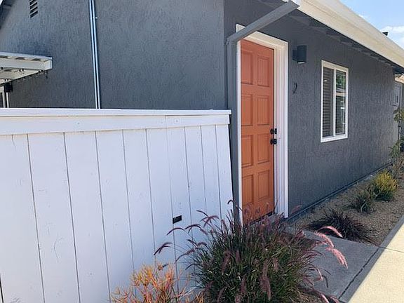 Front door of unit. Easy access outside. Can also exit the back yard from the fence.