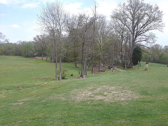 5 acres. Partially wooded.