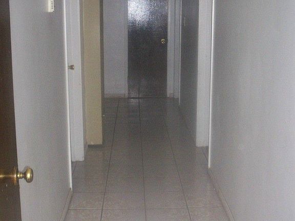 HALLWAY W/TILE FLOOR