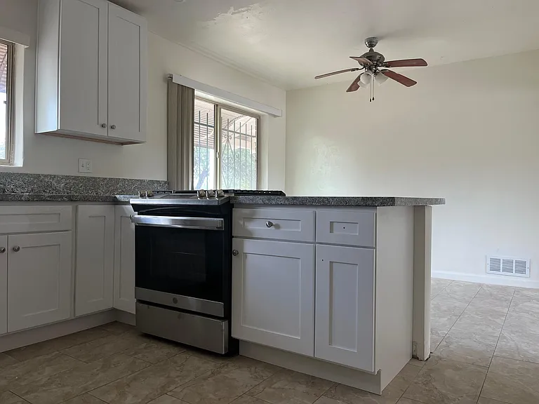 Kitchen opens to dinning area