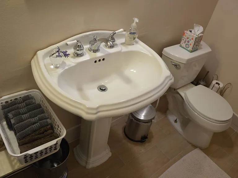 Full Bathroom with Pedestal Sink & Storage