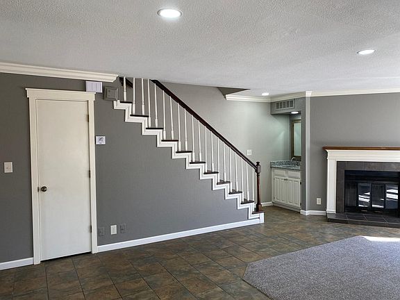 Gas log fireplace and wet bar