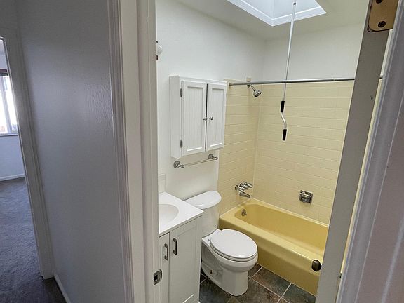 Hall way bathroom (pole is for the skylight)