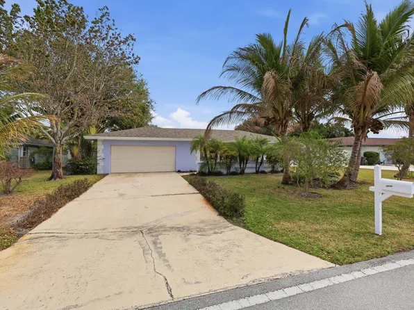 9696 Honeysuckle Avenue, Palm Beach Gardens, FL 33410