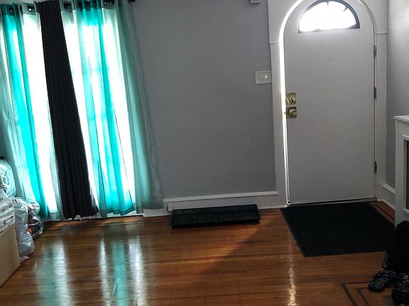 Large living room space with french doors