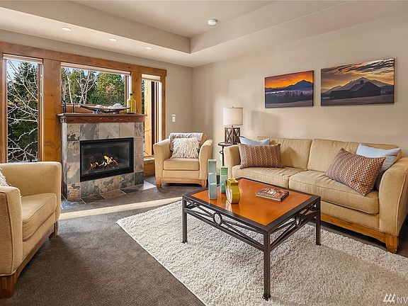 Living Room (new carpet throughout condo)