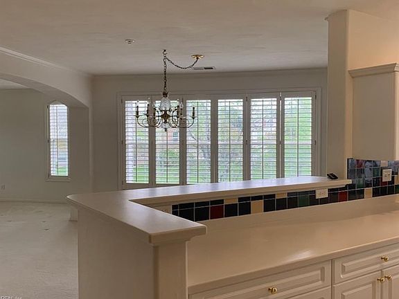 ENTER FRONT DOOR, WALK UP STAIRS TO 1 LEVEL LIVING. THE GARAGE ENTRY DOOR  IS BEHIND RED DOOR. PARK IN GARAGE, ENTER INTO HOME, WALK UPSTAIRS TO YOUR LIVING AREAS.  