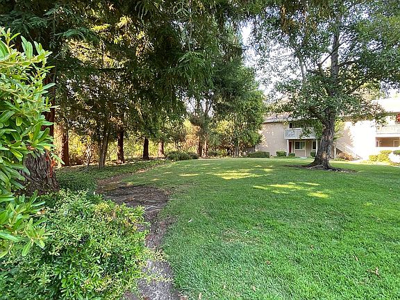 Condo looks out to greenbelt