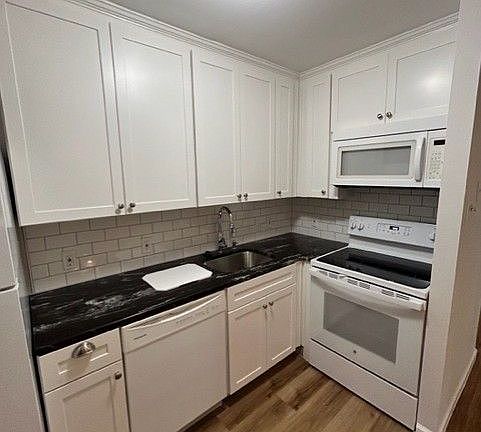 New appliances, granite countertop, disposal, microwave and more