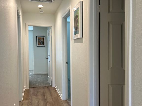 3 BEDROOMS AND 2ND BATHROOM (HALLWAY VIEW)