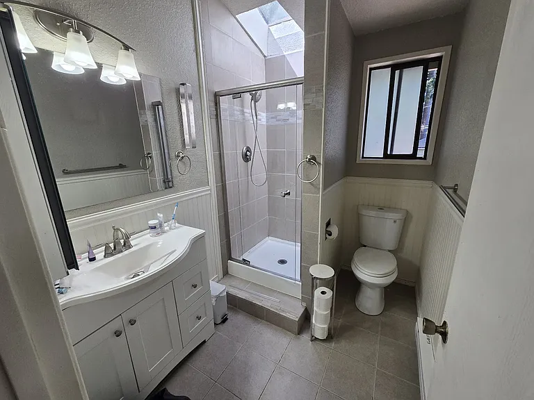 Primary Suite Bathroom. (Current Photo)