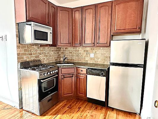 3rd image of 235 E 4th St APT 4C