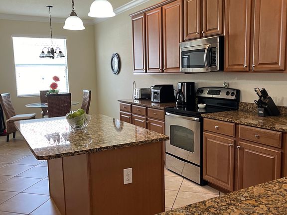Spacious kitchen with island and nook