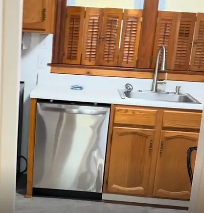Kitchen with dishwasher and sink