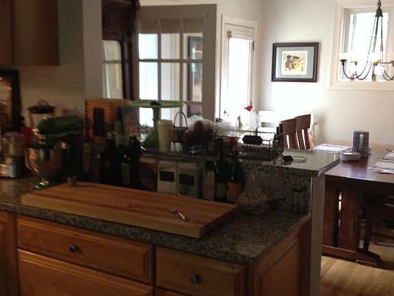 Granite Counter Tops shown with Chefs Wood Block (removed)
