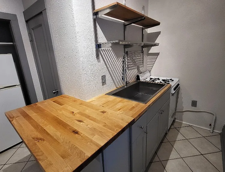 Kitchen Bar with Open Shelving, Large Stainless Steel Sink and Gas Stove!