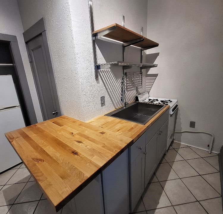 Kitchen Bar with Open Shelving, Large Stainless Steel Sink and Gas Stove!