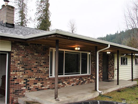 Front porch, note the pine underneath and the solid brick.