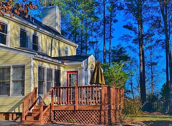 Rear deck overlooking your private yard.