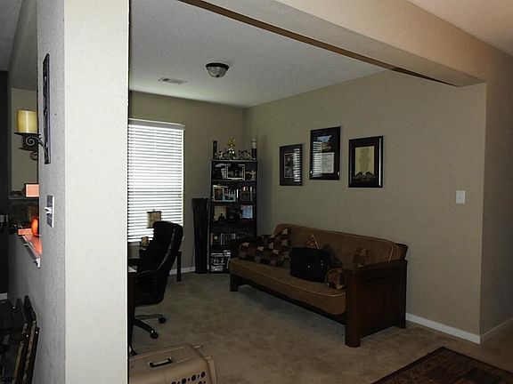 This is a view of the formal dining room currently being used as a study