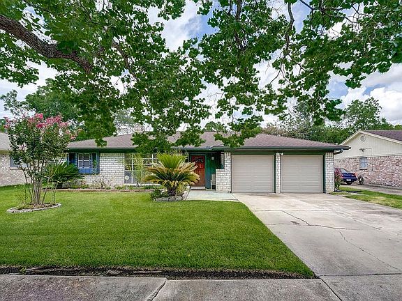 Lush green grass and mature landscaping welcome you.