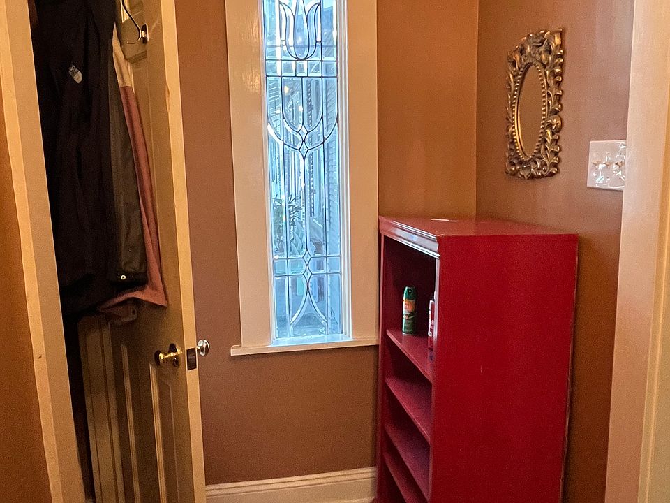 Entrance hall with coat closet.