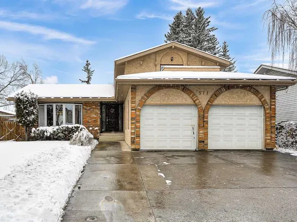 511 E Woodpark Cres SW, Calgary, AB T2W 2S1
