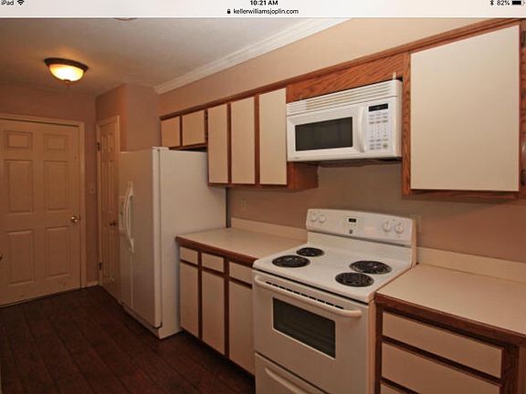 Refrigerator, range and microwave included