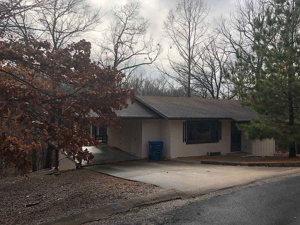 Great private setting with covered carport, outside storage, and extra parking available