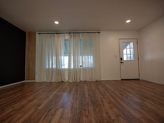 Living room view from opposite wall to the entrance