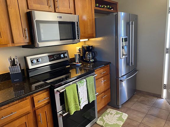 Upgraded kitchen w/brand new microwave, double oven and top-of-the-line Maytag refrigerator and dishwasher...(previous owner was a professional chef !)