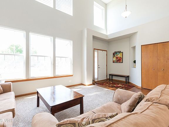 Two story entry way with large front coat closet.
